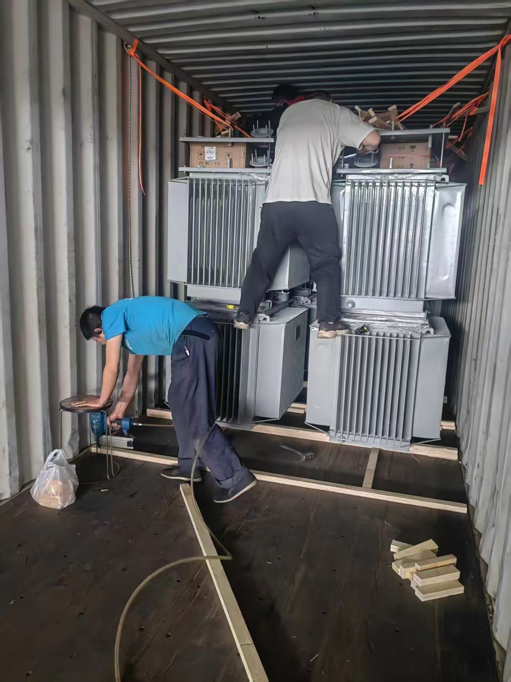 Transformers secured in a container